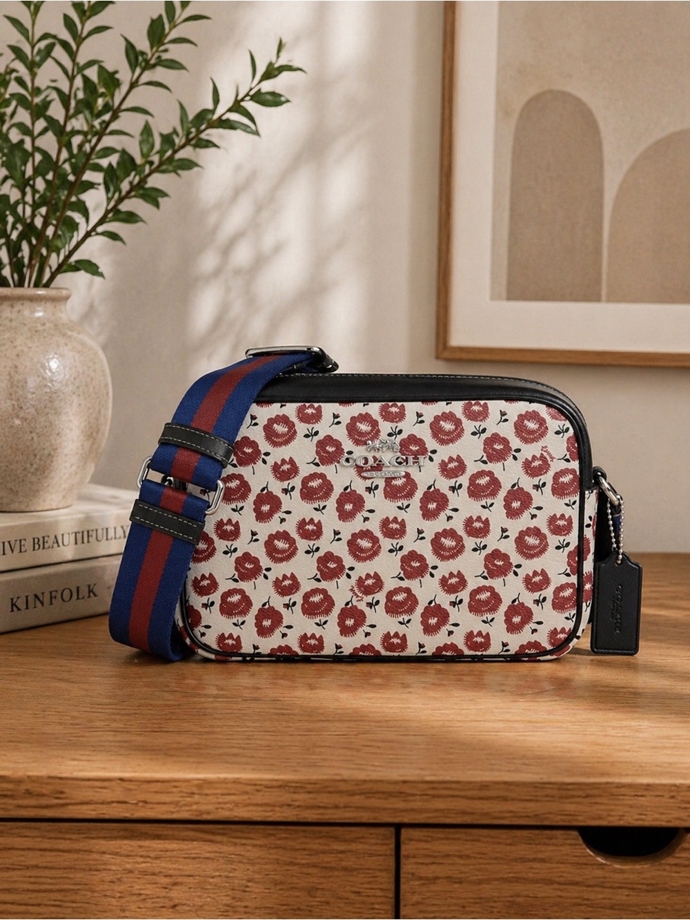 COACH Jamie Camera Bag in
Chalk Multi with a Floral Print.